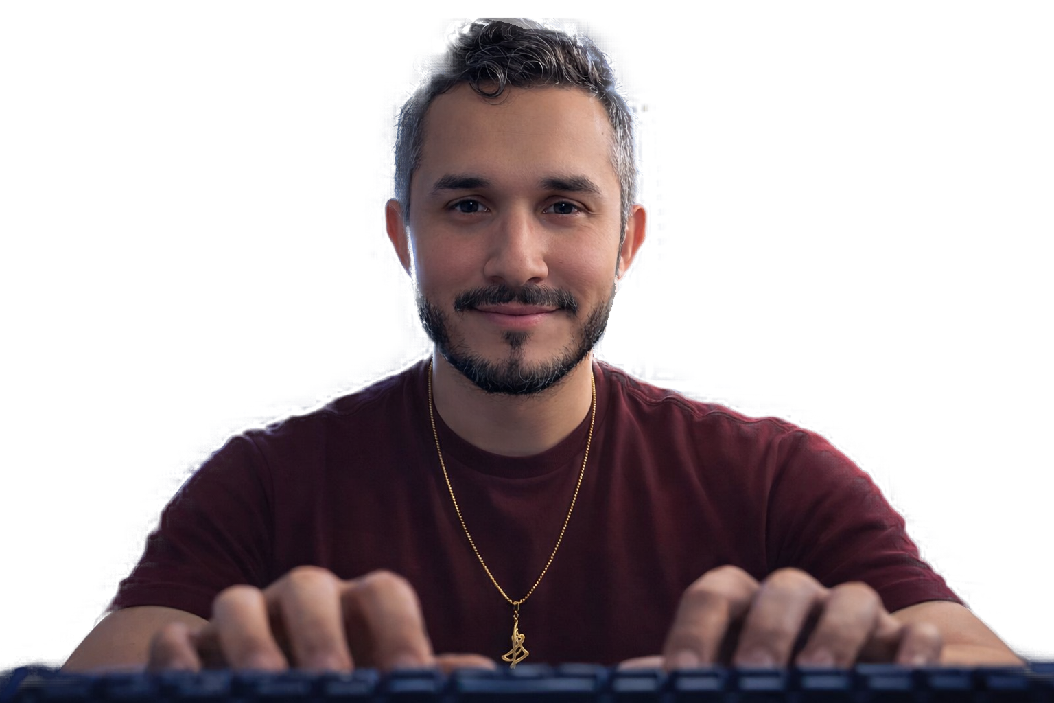 Foreground subject typing at keyboard